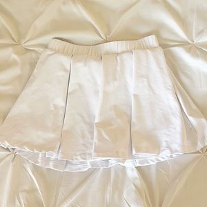 This is a SHEIN, white, pleated skirt, and in a size S.